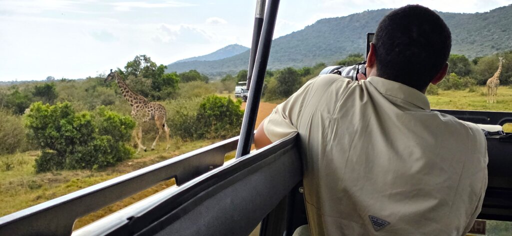 Tourists enjoying full day game drive in Masai Mara with crosswild safaris