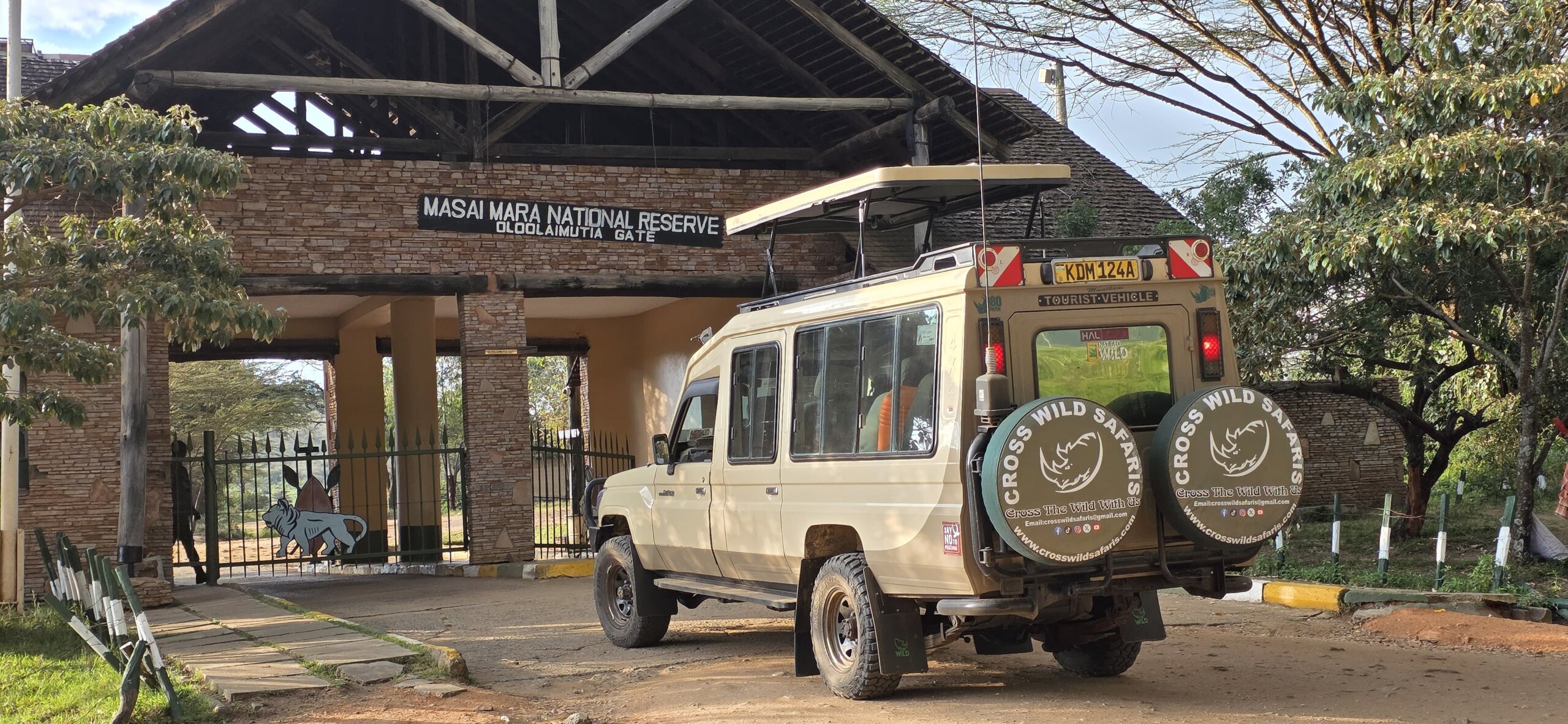 kenya big 5 safari -masai mara national reserve entrance WITH cross wild safaris