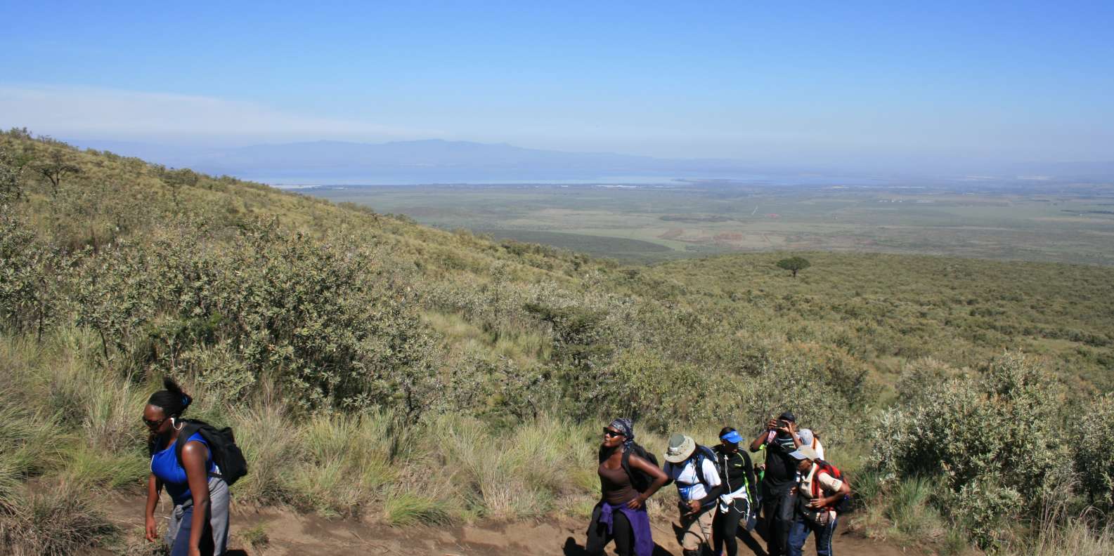 climbing mt longonot with cross wild safaris in Kenya alley in the background