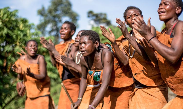 Local community members near Kibale National Park sharing cultural traditions
