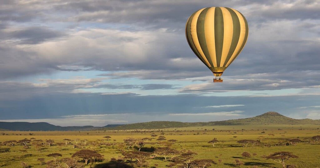 Hot air balloon flying over Serengeti National Park