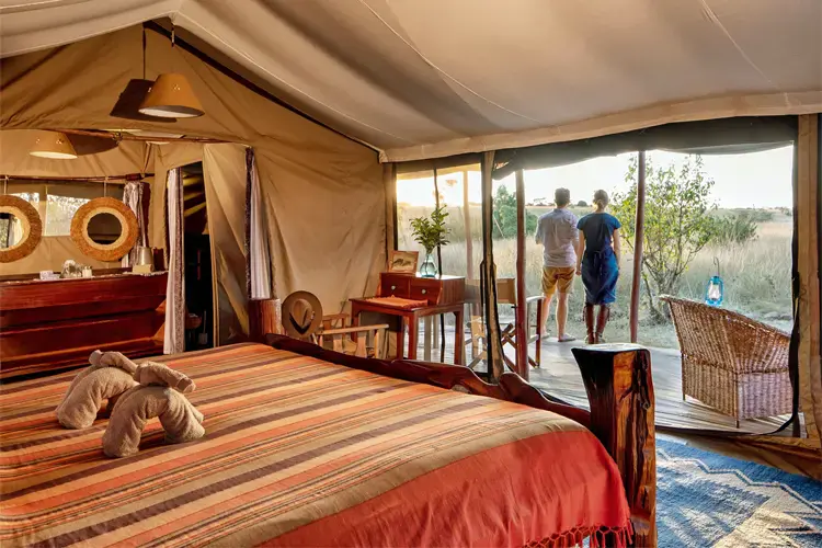 Luxury safari tent with panoramic views in Mara North Conservancy, Kenya.