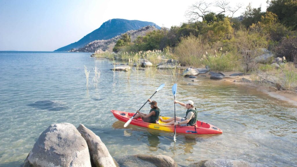 Tourists kayaking along the shoreline of South Island National Park in Kenya