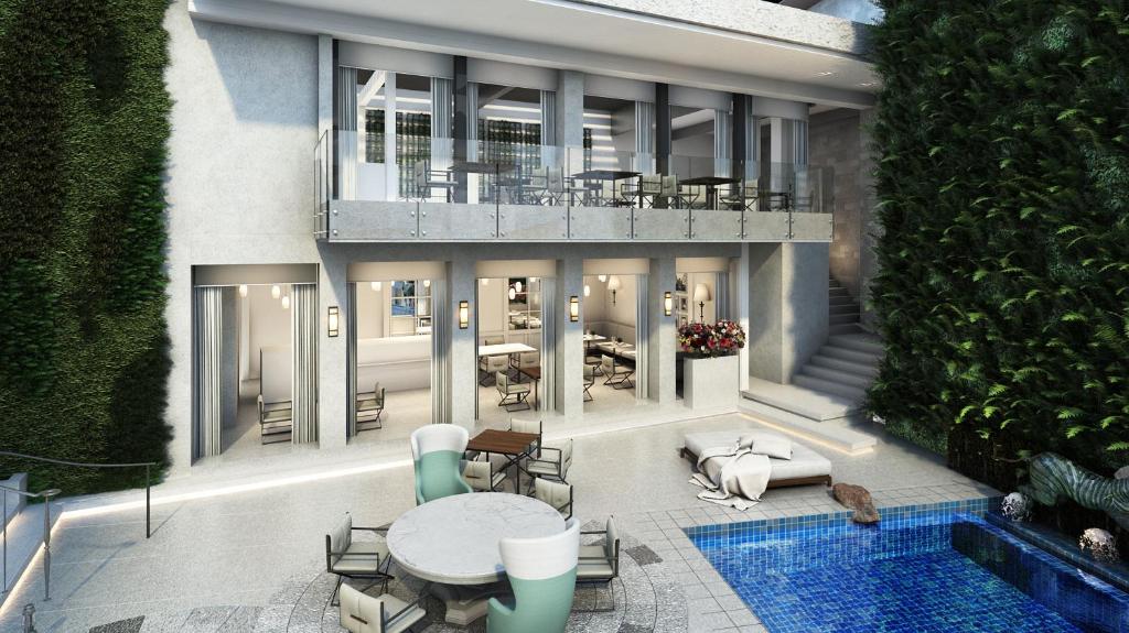 Modern hotels exterior in Nairobi with swimming pool and landscaped gardens.”