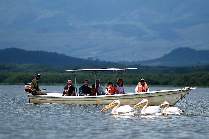 boat riding in Lake Naivasha with cross wild safaris