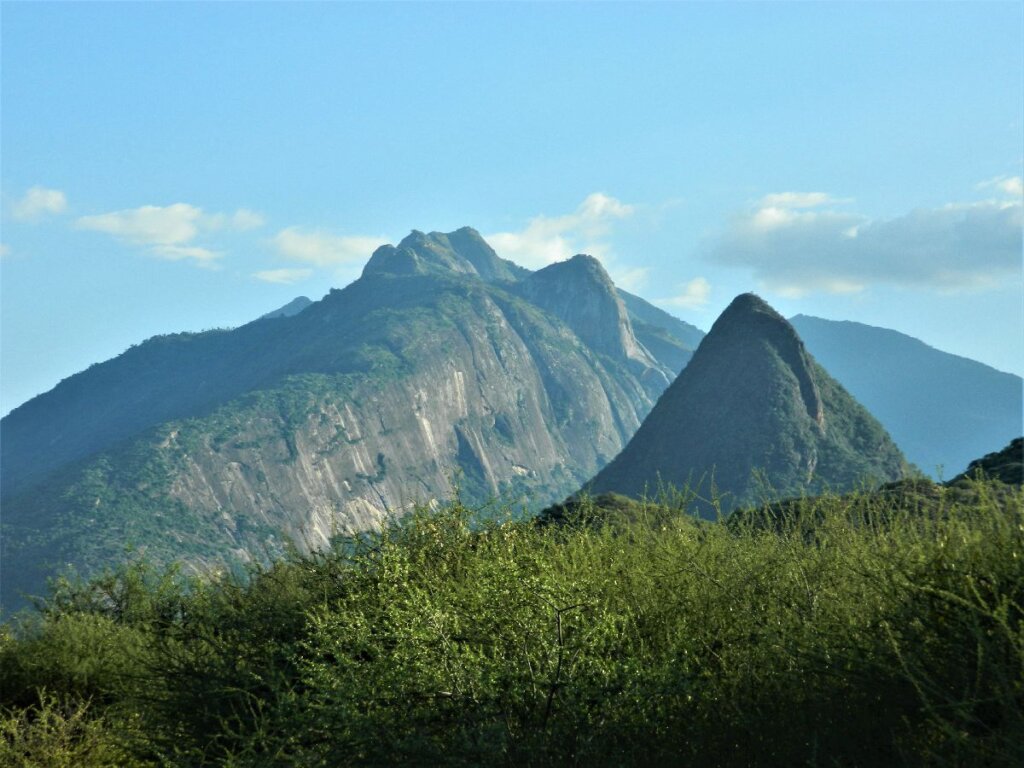 hiking up Nasolot Hill overlooking the savannah landscape in Nasolot National Reserve