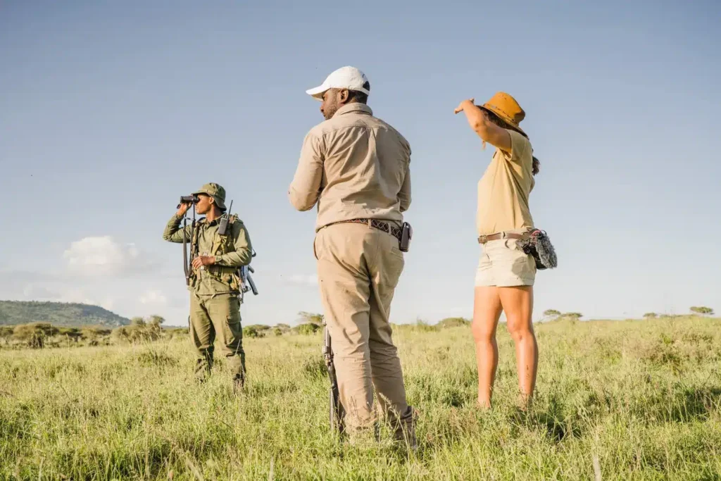Tourist packing neutral clothing for the great migration safari