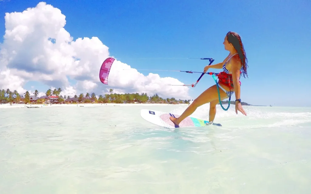 Teen learning kite-surfing at Paje Beach, Zanzibar