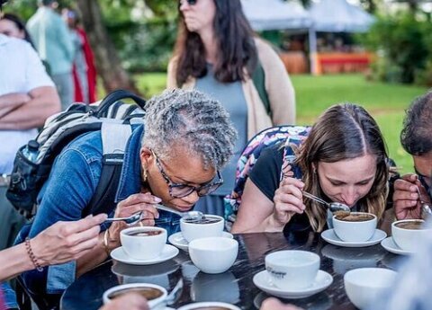 Tourists tasting coffee on our coffee tour
