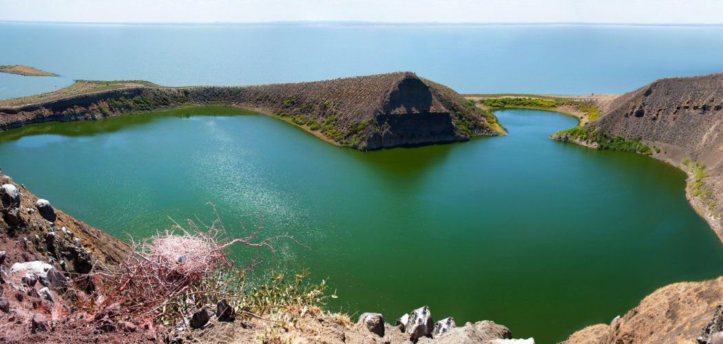 Aerial view of South Island National Park, Kenya, with turquoise waters and green landscapes with cross wild safaris