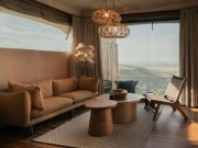 the interior of a luxurious suite at pearl mara - masai mara luxury safari