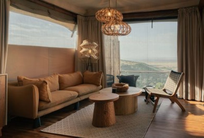 the interior of a luxurious suite at pearl mara - masai mara luxury safari