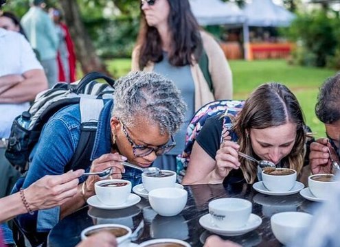 Tourists tasting coffee on our coffee tour